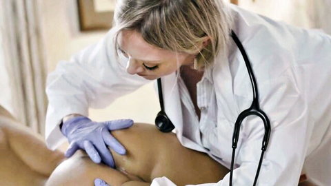 Blonde MILF doctor in gloves gropes curvy ebony patient's big ass during medical exam