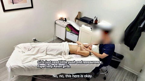 Petite Japanese girl topless during seductive massage therapy
