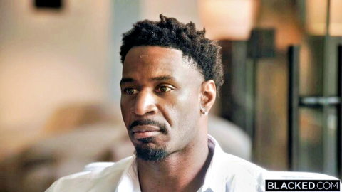 Handsome black stud in white shirt, intense gaze, Blacked.com with Cherry Kiss