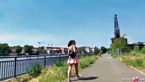 Curvy brunette teen walks outdoors in tiny pink skirt teasing big ass upskirt view