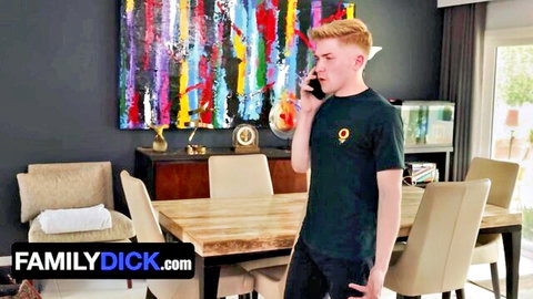 Ginger-haired young man in black tee talks on phone in stepson stepdaddy massage scene