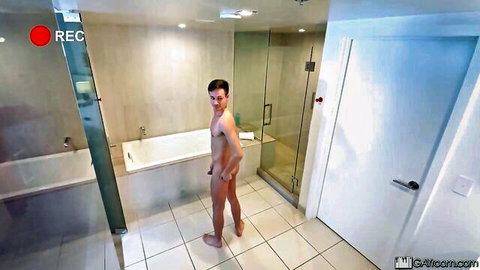 Nude trans stepbro posing in bathroom, big cock visible at Love Trans Sex