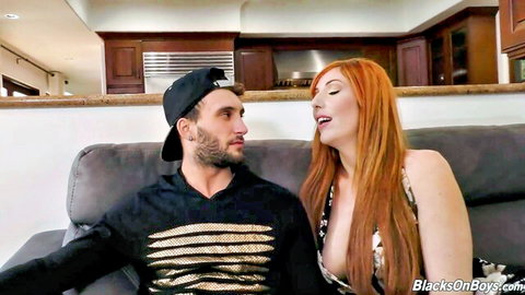 Bearded white man intimate with redhead wife on couch, Blacks on Blondes