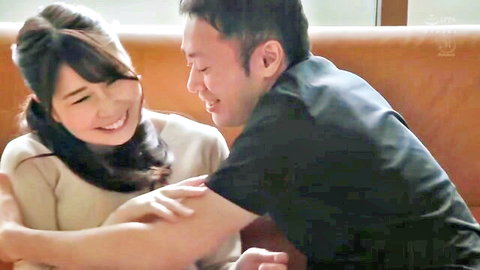 Intimate embrace of smiling Asian woman and man in JAV father-in-law creampie scene