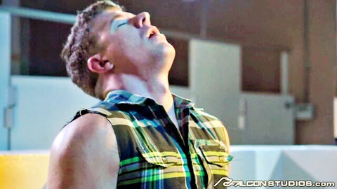 Muscular brunette hunk in green plaid tank top moans in ecstasy in bathroom
