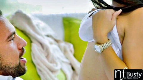 Busty brunette in white lingerie teases with perfect tits for tittyfuck