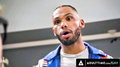 Black muscular man with cornrows in surprised expression for gay gangbang scene