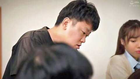 Japanese schoolgirl in uniform faces intense moment with man in JAV scene