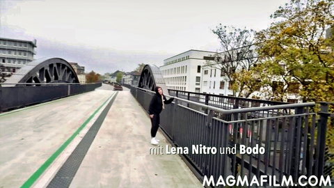 Lena Nitro and Bodo on urban bridge in MagmaFilm outdoor scene