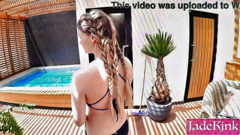 Hot blonde in black bikini by sauna pool, teasing stranger encounter