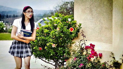 Penelope Woods as sexy schoolgirl in plaid skirt and glasses, skipping class POV