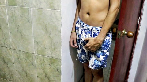 Slim Asian guy exposes hard cock in swim shorts, teasing for stepsister fuck