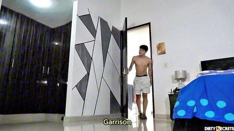 Shirtless Asian stepson Garrison in white shorts walking into bedroom