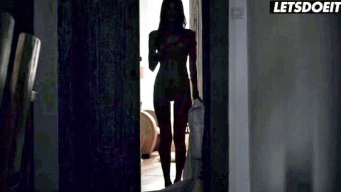 Silhouetted nude babe teasing in dark doorway holding towel exposing sexy curves and ass