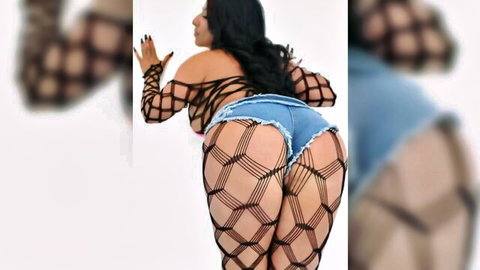 Oiled ebony MILF big ass in fishnets and tiny denim shorts