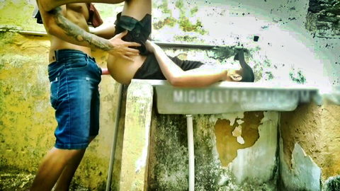 Tattooed muscular man fucking young woman bent over laundry sink doggystyle cock in pussy