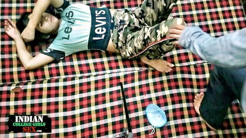 Indian Muslim college girl lying in casual Levi's top and camo pants, rough sex setup