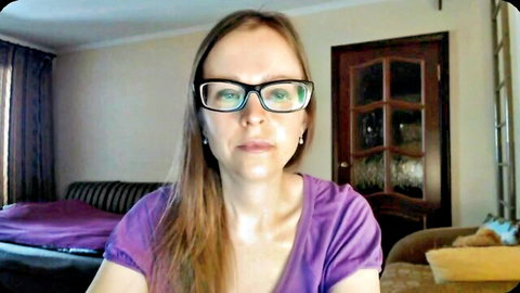 SmallUniverse cam girl with glasses and long hair in purple top