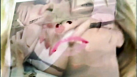 Blurry close-up of pink tongue licking white cum-covered skin in vintage blowjob