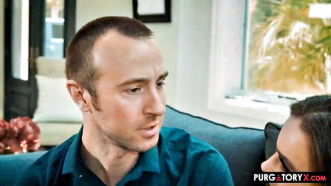 Natasha Nice in intimate couple conversation on couch, sharing wife scene