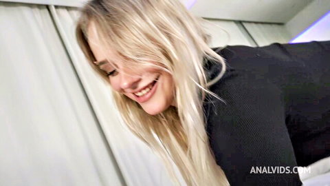 Sophia Power blonde smiling in black top, teasing anal fun