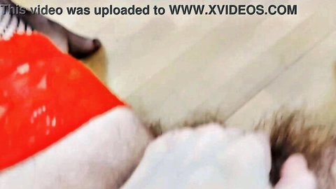 Santa hat covering hairy pussy on wooden floor with heavy XVideos watermarks