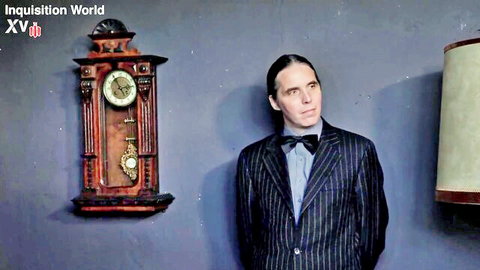 Stern pinstripe-suited man in bowtie stands by ornate wooden clock in Inquisition World BDSM punishment scene