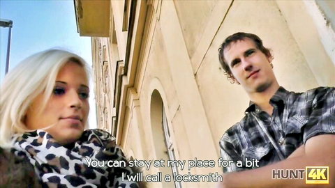 Blonde woman in leopard top chats with man in plaid shirt, Hunt4K neighbor exchange scene