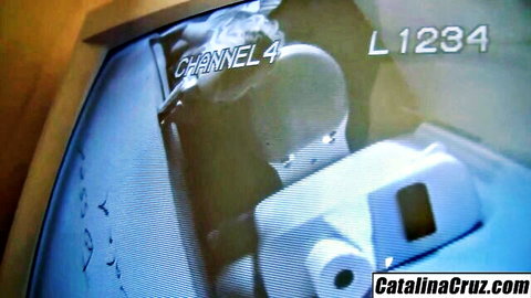 Empty gloryhole bathroom stall with toilet paper roll on Catalina Cruz channel