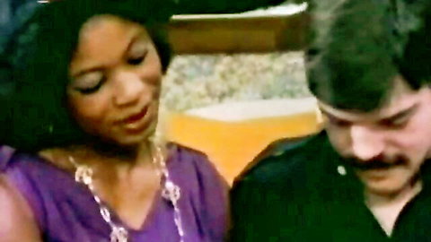 Vintage black woman in purple dress with man in Beauty Film classic porn