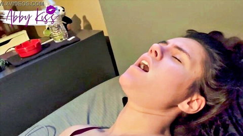 Abby Kiss in ecstasy, mouth open during vibrator pleasure