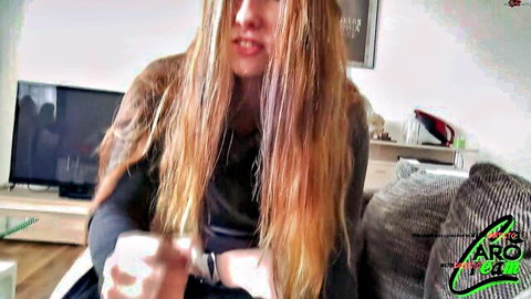 Blonde teen with long hair teases blowjob by licking fingers near open mouth in POV
