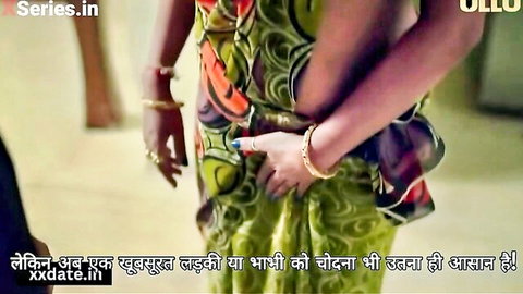 Gorgeous Indian MILF in green saree teasing curves from side view