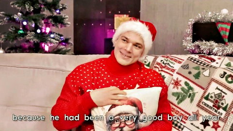 Lucky guy in Santa hat holds pillow hiding young slender Asian beauty as Christmas gift