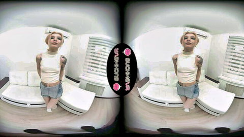 Tea Mint posing in white tank top and denim shorts for VR porn teaser