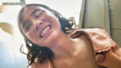 Aimi Yoshikawa smiling playfully in open pink top, JAV thumbnail