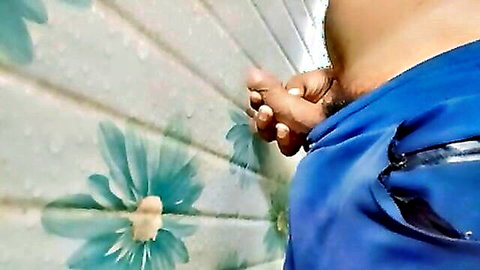 Hairy man's bare ass exposed with fingers spreading his tight asshole closeup