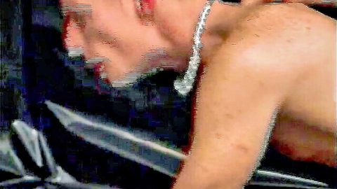 Blurry close-up of mature man receiving intense oral in gay sex