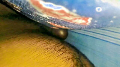 Blurry close-up of naked young gay boy's hairy groin in casting video