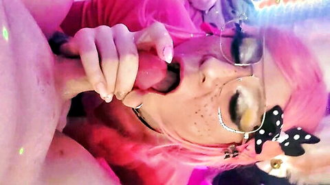 Pink-haired trans babe with glasses and freckles deepthroats big cock eagerly
