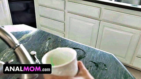 Skylar Snow teasing in kitchen with drink, craving anal satisfaction from stepson