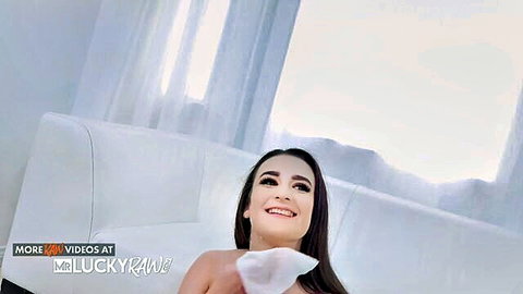 Lyra Lockhart smiling seductively with big boobs, amateur horny girl from Mr Lucky RAW