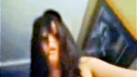 Hot Arab Algerian woman with long dark hair, intense close-up gaze