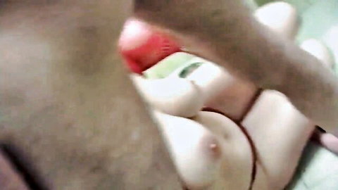 Nude Asian woman with big tits in explicit oral sex scene after cum