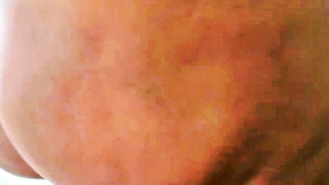 Blurry close-up of curvaceous woman's skin, big fat ass secretary vibe
