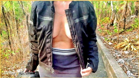 Blonde woman flashes breasts and pussy in open jacket and tiny skirt outdoors
