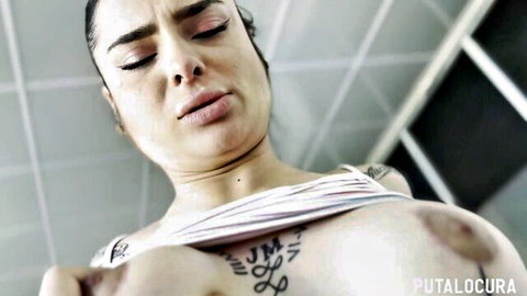 Nadja Hot voluptuous tattooed Spanish babe exposing large breasts