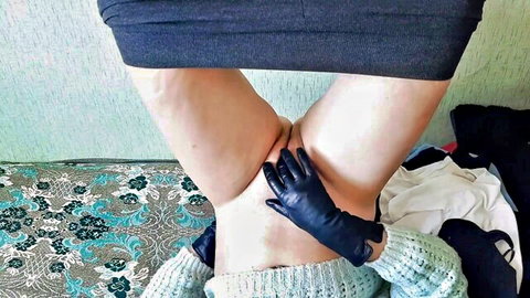 Yoga instructor in hiked skirt masturbates intimately with black leather gloves