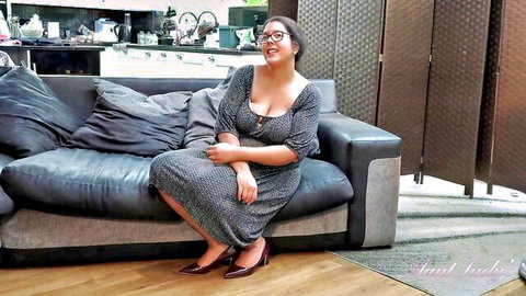 Cassy Hill, hairy BBW MILF teases with big natural tits in low-cut dress