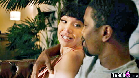 Little Puck in intimate interracial embrace with black stud, cleavage tease